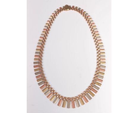 A 9ct tri-coloured gold fringe necklace, the graduated fringe of alternating rose, yellow and white gold, with hexagonal box 