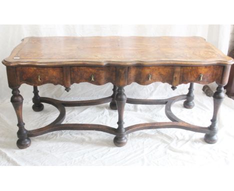 Antique walnut inlaid console table, the skirt with four freize drawers above a united stretcher on bun supports, 165cm long 