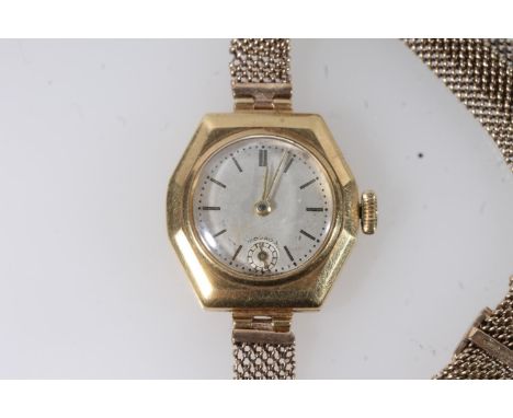 18ct gold cased Movado ladies cocktail watch, the hexagonal case with silvered dial, baton five minute markers and dot minute