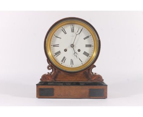 Victorian Walnut and Ebony mantel clock, the drum head white enamel dial marked Dent within roman numerals, over dolphin supp