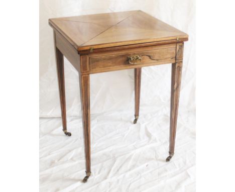 Edwardian mahogany and inlaid envelope card table with single frieze drawer and square tapering legs capped with brass castor