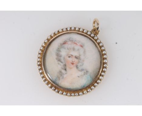 Antique portrait miniature, of an 18th century lady, framed within a seed pearl and yellow metal pendant, W3.8cm.