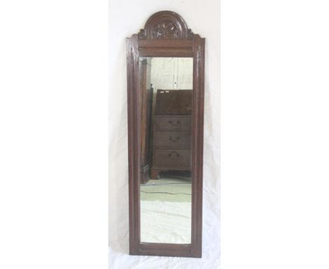 18th Century oak framed rectangular wall mirror with carved arch top, 137cm tall x 42cm wide.