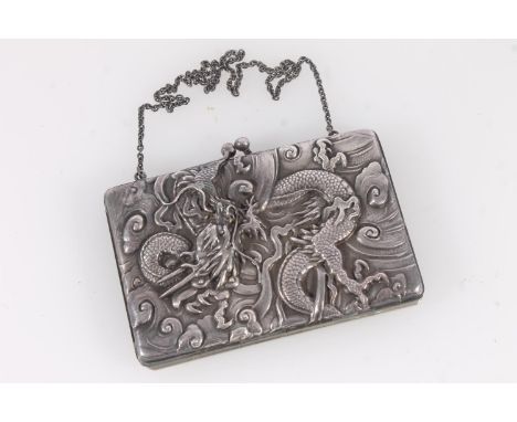 Chinese export silver card case, post Republic period, the front cast with dragon amongst clouds with plain back, interior st