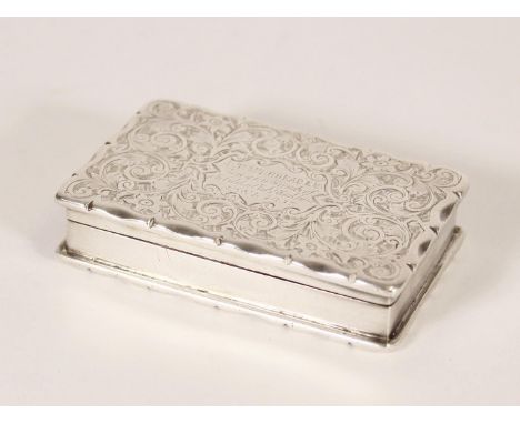 Antique Victorian silver snuff box of rectangular shape having serpentine edge with all over incised scrolling foliate decora