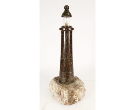 Cornish serpentine lighthouse lamp sculpture, mid 20th century, on natural granite rough slab base, H53cm.