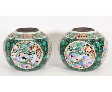 Pair of Chinese porcelain Famille Verte vases, the ovoid bodies with reticulated scrolling patterns over four further reticul