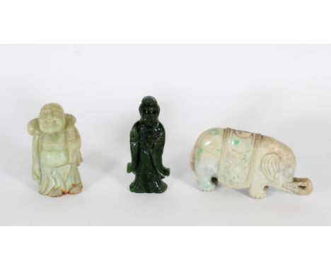 Chinese carved figurine of Liu Hai, the jovial figure with shouldered sack, together with a carved Elephant and green Guanyin