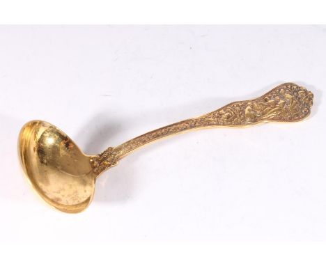 American early 20th century silver gilt ladle, the shaped terminal well cast with classical scene of supplicant before the th