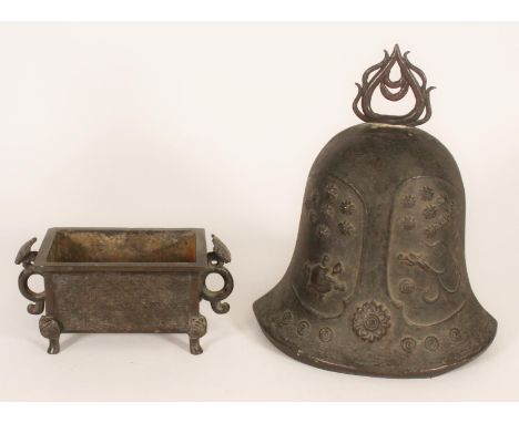 Chinese bronze temple bell decorated in relief with dragons and turtles amogst foliage, together with a small two handled cen