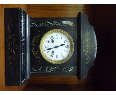 A 1920s slate and marble cased bracket clock, having a later quartz movement, faced by a white enamel Roman dial, on bracket 