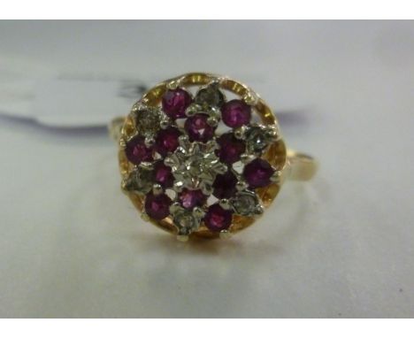 A 9ct gold ring, set with amethysts and diamonds       11