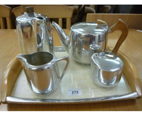 A Picquotware aluminium five piece tea set, viz. a teapot, coffee pot, a sugar basin, a milk jug and a tray  16'' x 12''     