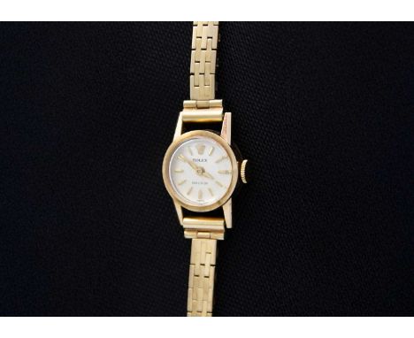 ROLEX - A Precision 9ct lady's manual wind bracelet wristwatch. Circa 1961, the 13mm signed silvered dial with gilt baton mar