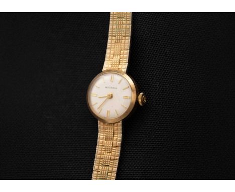 RODANIA - A 9ct lady's manual wind bracelet wristwatch. Signed 15mm silvered dial, signed 17 jewel movement, the case and bra