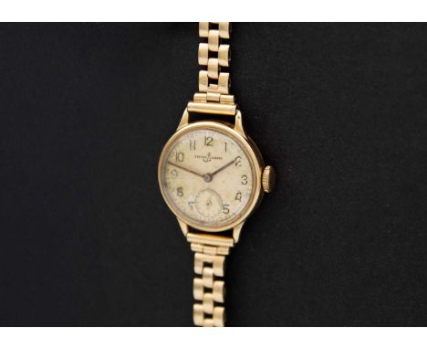 ULYSSE NARDIN - A 9ct lady's manual wind bracelet wristwatch. The signed silvered dial with black Arabic numerals and subsidi