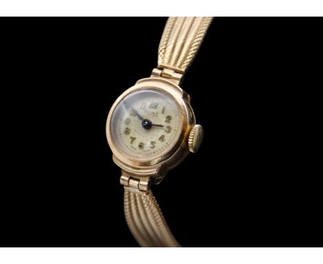 RONE - A 9ct lady's manual wind bracelet wristwatch. With 12mm dial, signed 17 jewel movement, bracelet and case hallmarked L