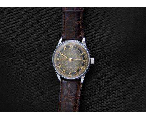 LEMANIA - A stainless steel gentleman's manual wind wristwatch. The 28mm signed dial with a gilt and grey mottled finish, gil