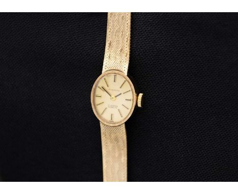 EVERITE - A 9ct lady's manual wind bracelet wristwatch. With signed 13mm oval gilt dial, 17 jewel Swiss movement, Sheffield i
