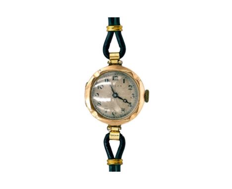 ROLEX - A 1920's lady's 9ct manual wind wristwatch. The signed guilloche silvered dial with black Breguet numerals and outer 