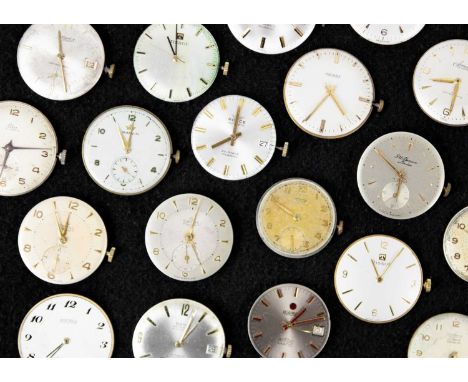 A quantity of gentleman's manual wind watch movements and dials for repairs and spares. Circular dials, to include Swiss make