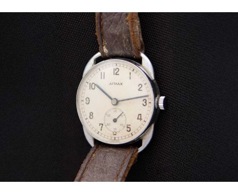 AUDAX - A nickel-cased fixed lug gentleman's manual wind wristwatch. The 28mm signed silvered dial with black Arabic numerals
