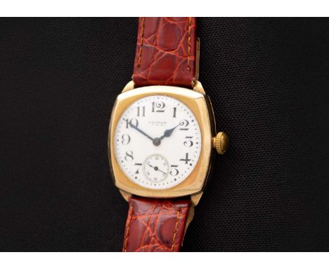 WALTHAM - A 9ct cased 1930's cushion cased gentleman's manual wind wristwatch. The 25mm white enamel dial signed WALTHAM U.S.