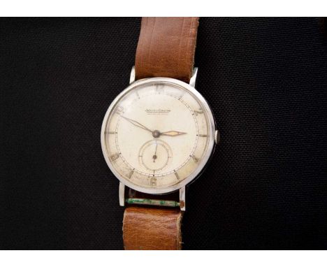 JAEGER-LECOULTRE - A 1940's stainless steel pie-pan dial gentleman's wristwatch. The signed silvered dial with luminous Arabi