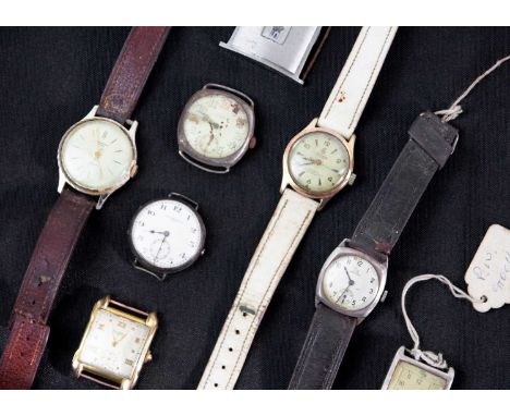 Eight various gentleman's manual wind wristwatches for repair of spares. To include a J.W. Benson silver cased fixed lug, 32m