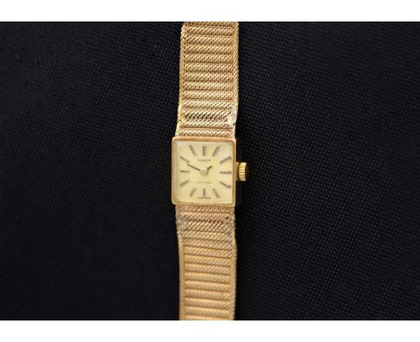 TISSOT - A Stylist 9ct lady's manual wind bracelet wristwatch. Signed 12mm gilt dial, signed 17 jewel movement, the case and 