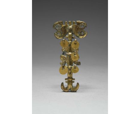 A Panama tumbaga pendantWestern Peninsula, circa 800 - 1500 ADmodelled as a caiman with three bars to its back with gold disc