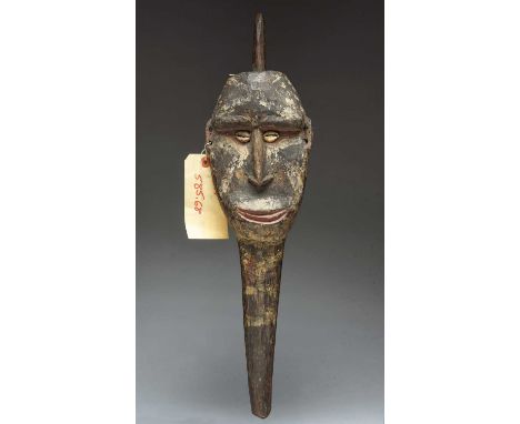A Manambu headYambun Village, East Sepik, Papua New Guineawith an integral spike to the top of the head, with cowrie shell ey
