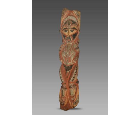 An Abelam male figurePapua New Guineastanding and with red, yellow, black and white pigment decortation,113cm high.Provenance