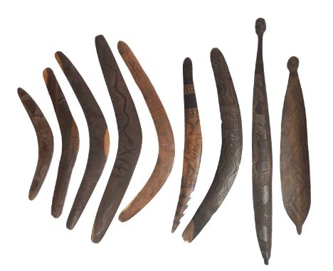Six Aboriginal boomerangsAustraliathree carved depicting animals, 39.5cm, 61cm and 71cm wide, one with notched wavy and linea