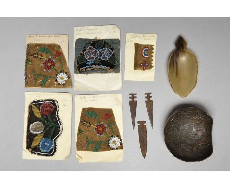 Five North American beadwork fragmentscoloured glass beads on buckskin and velvet,a horn scoop, three Sioux metal arrow heads