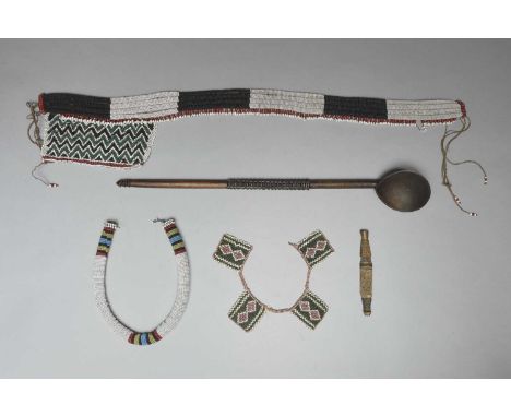 Three Zulu beaded adornmentsSouth Africaincluding a necklace, a waistband with pubic cover, 70cm long, and a four panel neck 