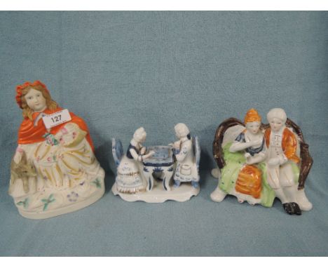 A selection of vintage ceramic figures and figurines Staffordshire flatback style