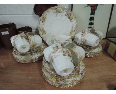 A part tea service by Tuscan pat no. 351548 With a Regency style and hand enamel detailing