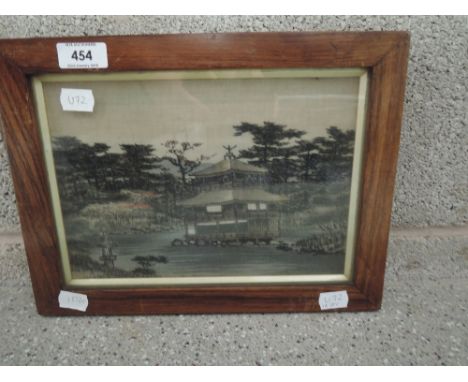 A small oriental needle work tapestry cross stitch depicting Chinese or Japanese abode