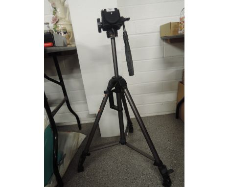 A Vanguard adjustable photographers tripod
