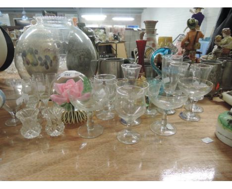 A selection of glassware including babycham