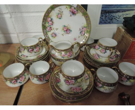 A vintage dinner / tea service in a Japanese style with floral design and gilt edge work 25 pieces approxGood condition apart