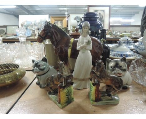 A selection of vintage ceramic figures and novelties including cat pair horse book ends and shire horse