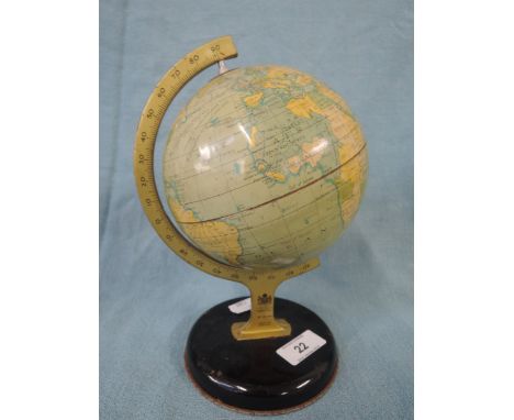 A tin and lithograph printed globe of the world by The Chad Valley toy company