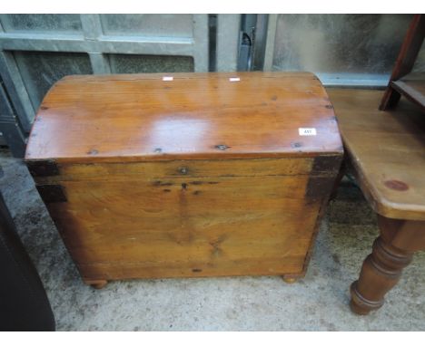 A rustic dome top trunk