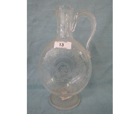 A vintage glass decanter / claret jug with etched ivy leaf decoration and crestVery slight chip on rim