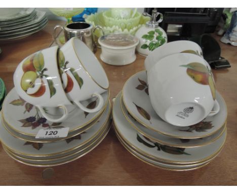 A selection of tea cups and saucers by Royal Worcester Evesham pattern