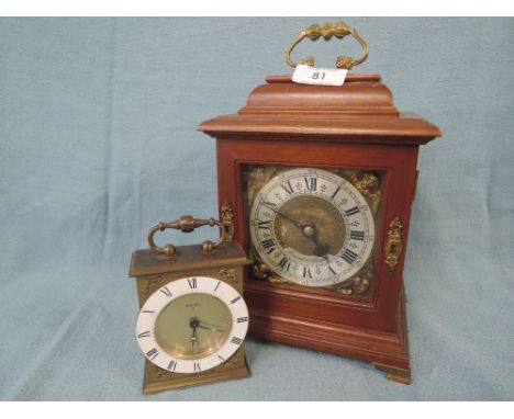A selection of vintage clocks including treen and brass Baronet of London and SWIZA Swiss brass and enamel clock