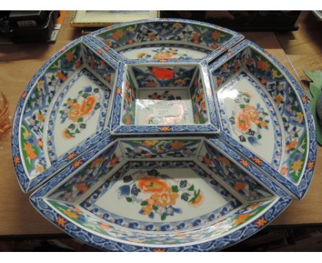 A vintage ceramic five part segmented party dish with an oriental theme