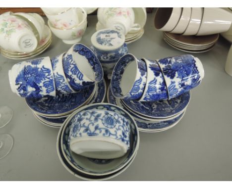 A selection of vintage ceramics including delft ware cups and saucers, and oriental ginger jar